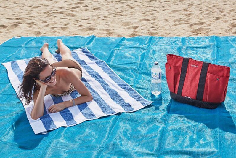 Sandfri strand/ picknick matta för den varma sommaren.